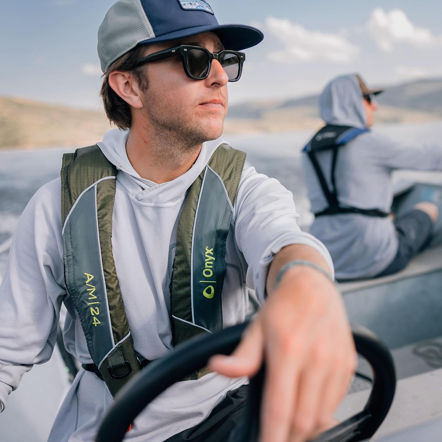Onyx Outdoor A/M-24 Auto/Manual Inflatable Life Jacket Green – Type V PFD with 24lb Buoyancy and Compact Fit - Image 2
